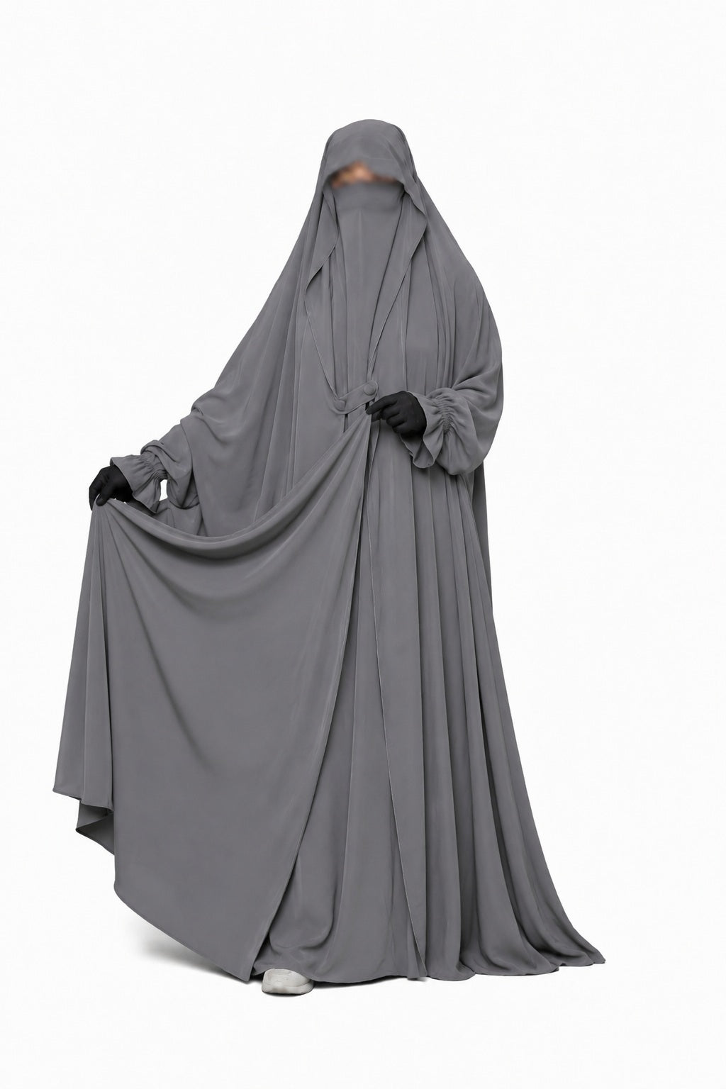 Jilbab 1 pièce gris Liyane coupe oversize en crêpe royal, montrant la fluidité du tissu.