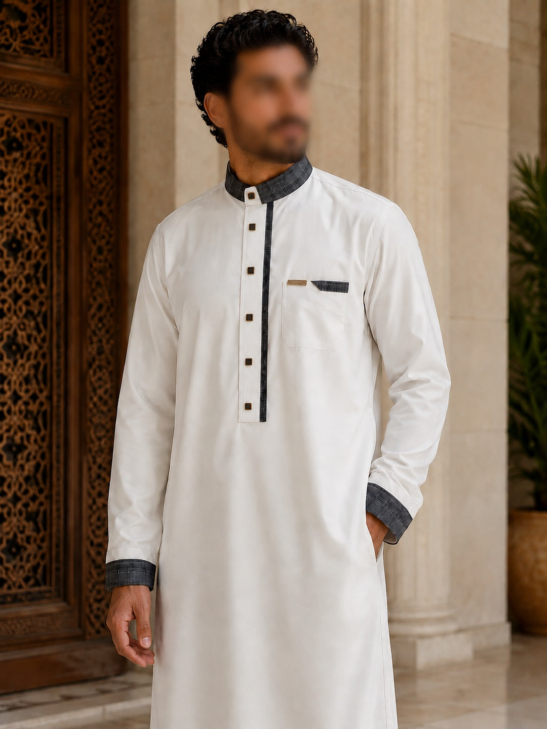 Qamis blanc contemporain pour homme avec col mao gris anthracite, boutons premium et finitions élégantes.